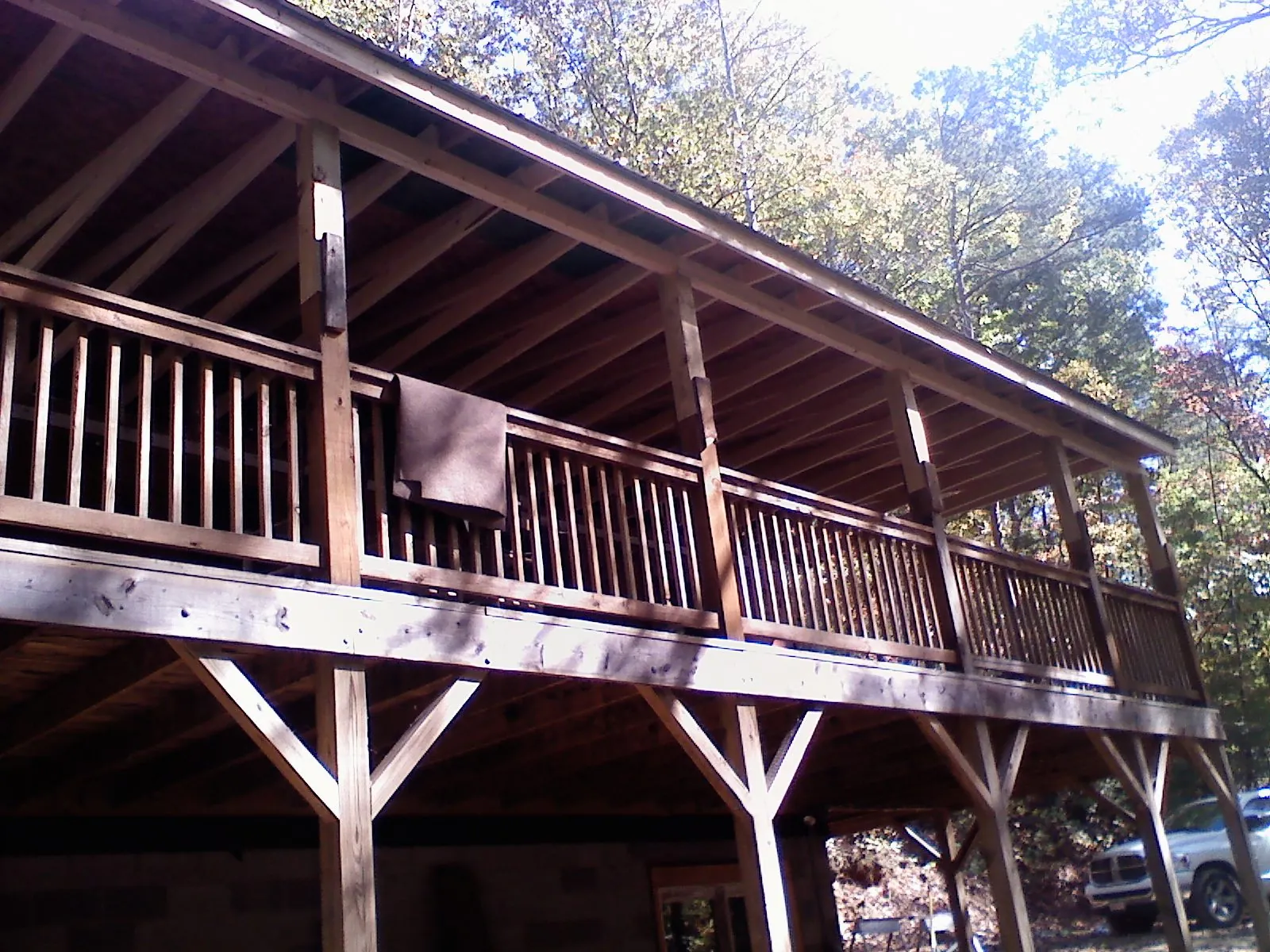 Timber framing under a new elevated porch and deck — Roof Leak Repair in Garden Grove by Roofing Brothers